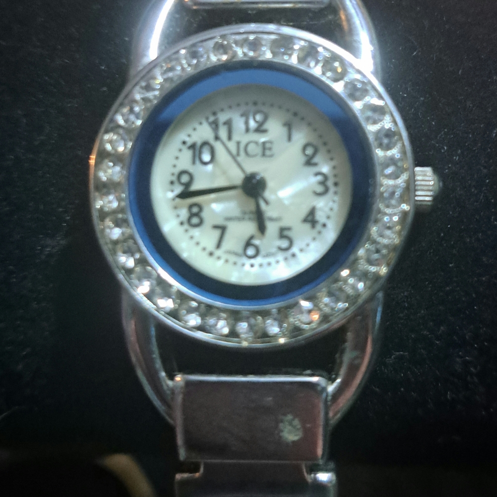 Ice Silver Watch with Blue Bezel and Crystal Details